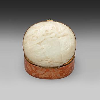 365. A metal box with cover with a large carved jade plaque, China early 20th Century.