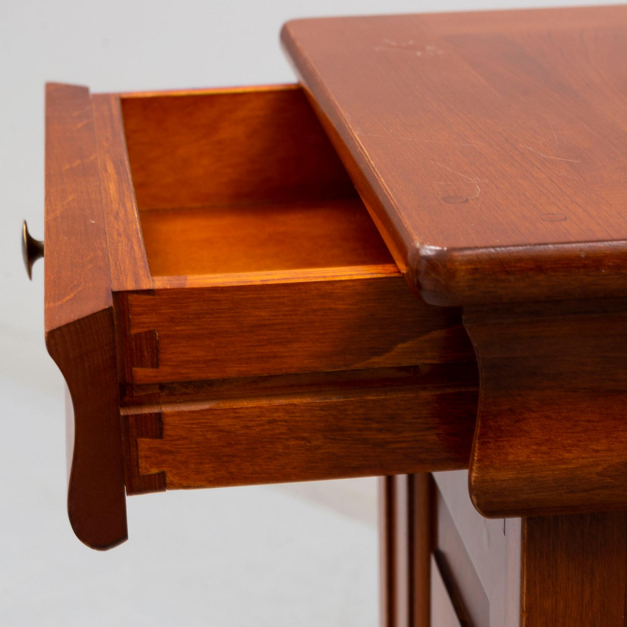 A pair of Italian bedside tables, Consorzio Mobili, second half of the 20th century.