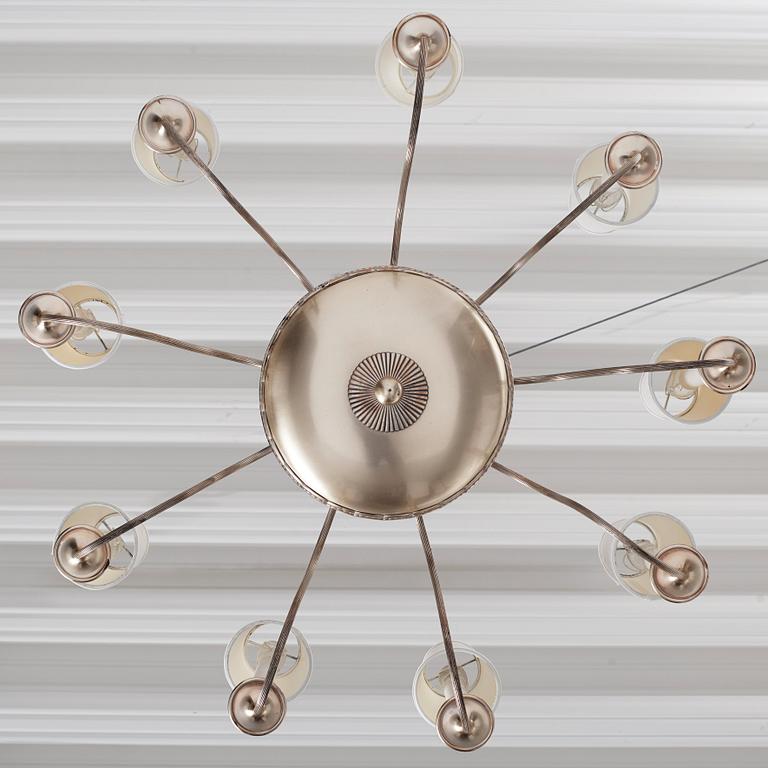 Swedish Grace, a silver plated ceiling lamp for nine lights, 1920's.