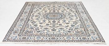 A Nain carpet, c. 275 x 195 cm.