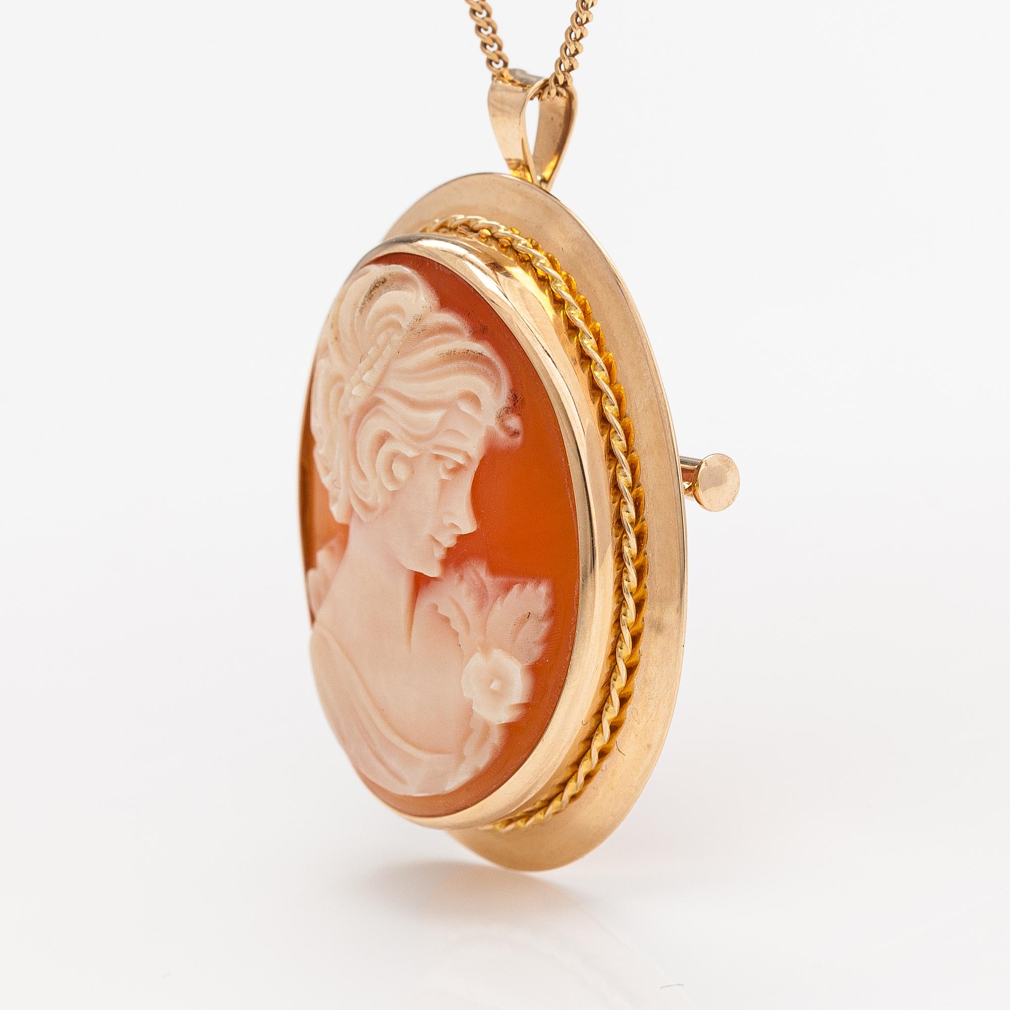 A 14K gold and sea shell came necklace/brooch. Kultakeskus, Hämeenlinna 1982.