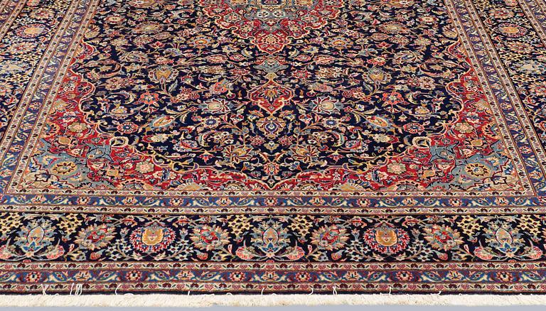 A Keshan carpet, 338 x 264 cm.