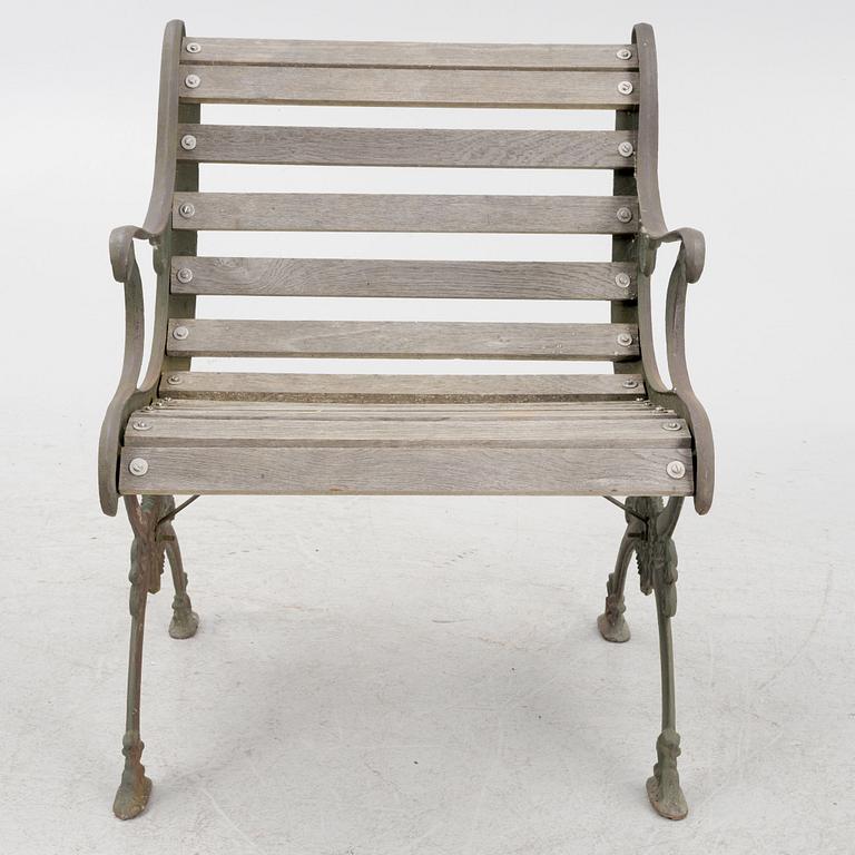 A cast-iron frame garden chair, 20th century.