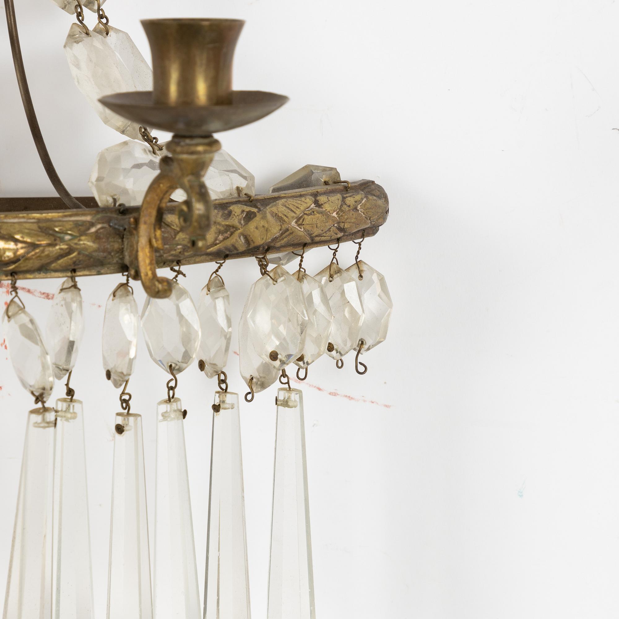 A pair of Gustavian style wall sconces, early 20th Century.