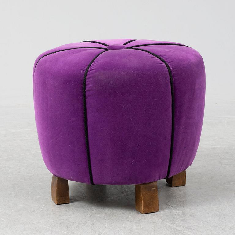 A 1940's table with pouf.