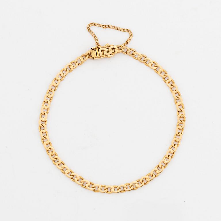 18K gold bracelet.