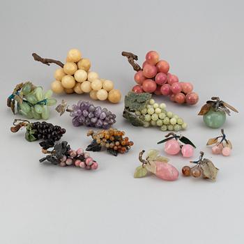 13 stone table decorations of grapes, 20th century.