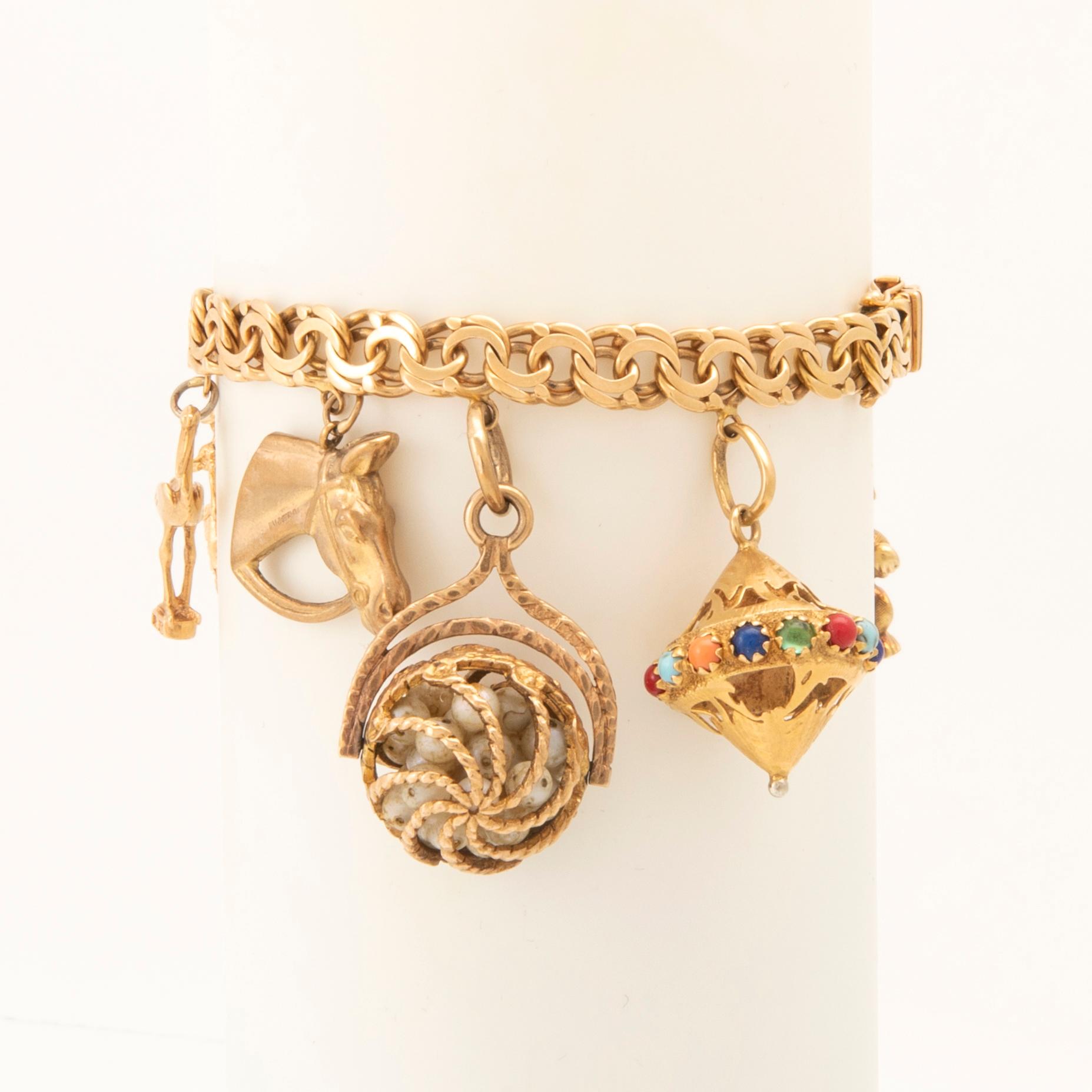 Armband Bismarck-länk med berlocker.
