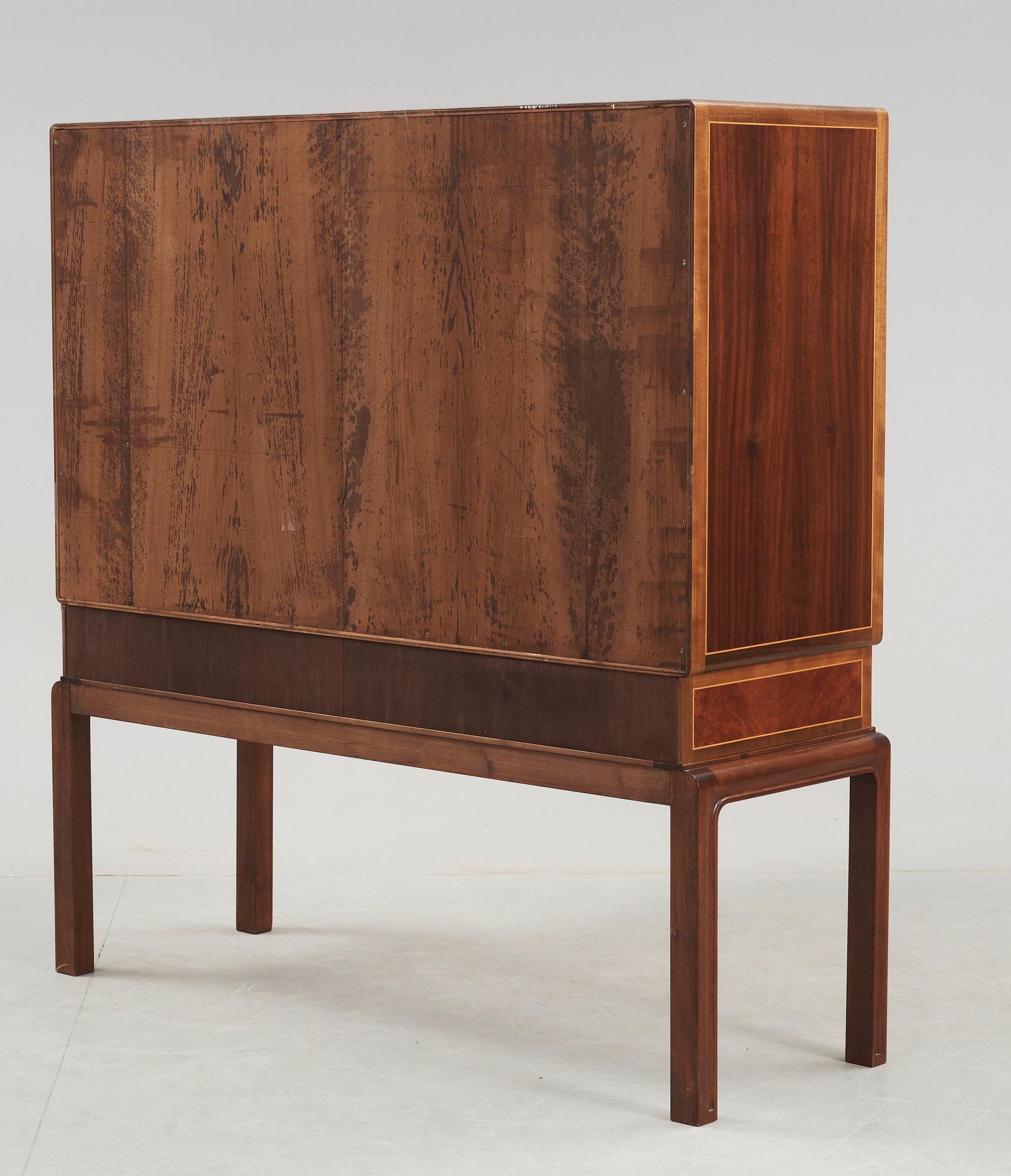 A Georg Johansson cabinet with inlays of several exotic woods, Gothenburg Sweden 1938.