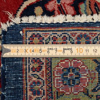 A semi-antique Kashan carpet, Central Persia, c. 320 x 237 cm.