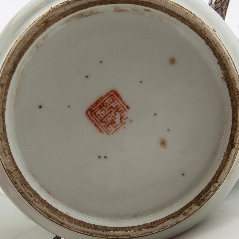 A set of three differently decorated tea pots with covers, Qing dynasty, 18century and 20th century.