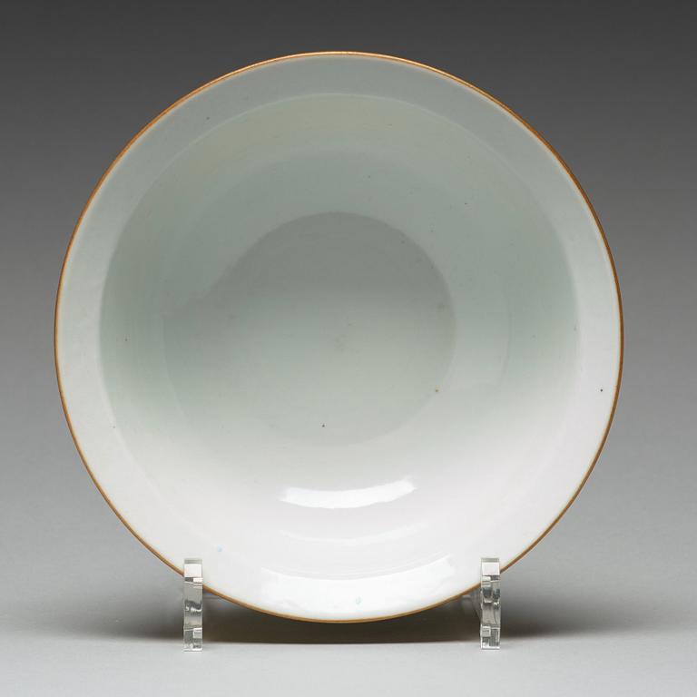 A yellow glazed sgrafitto bowl, late Qing dynasty with Qianlong mark.