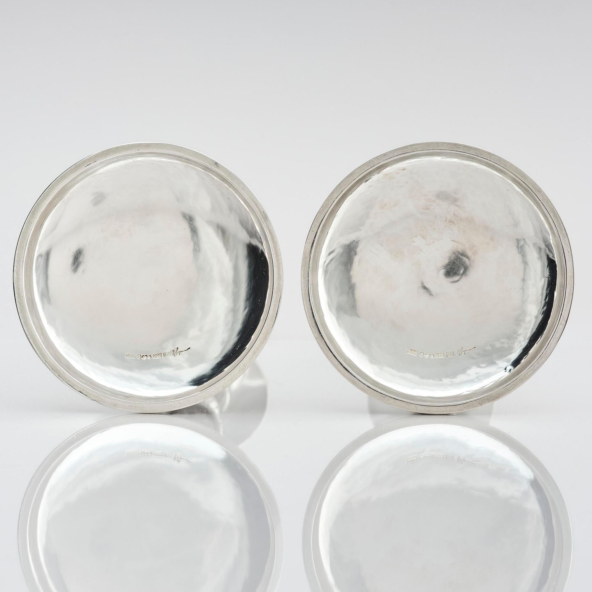 Henrik Ingemansson, a pair of sterling silver and Älvdal porphyry candelsticks, Ingemansson's Smithy, Stockholm, 2002.