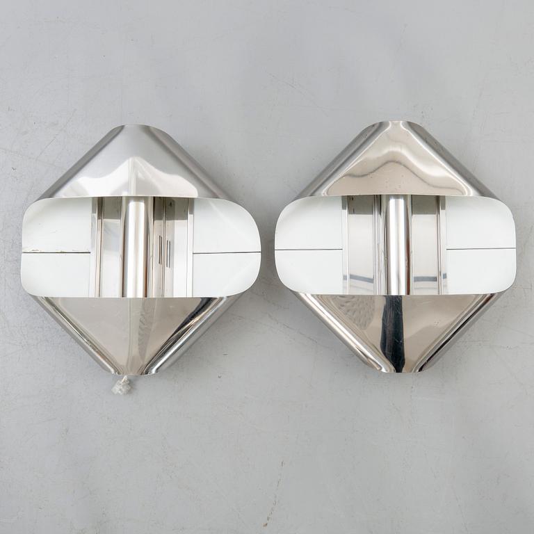 Wall lamps a pair of Guzzini Italy 1970s.