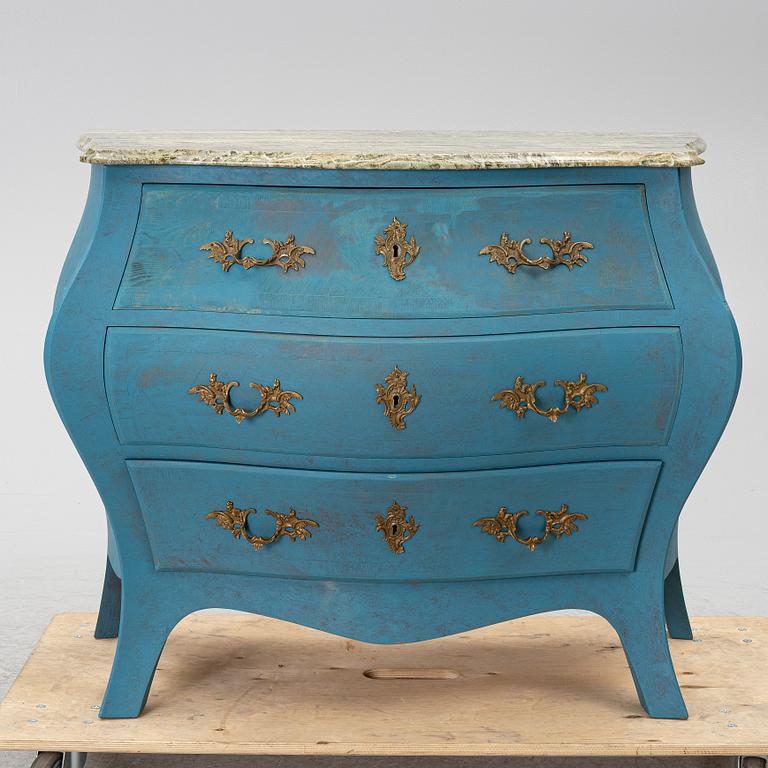 A Rococo style chest of drawers, early 20th century.