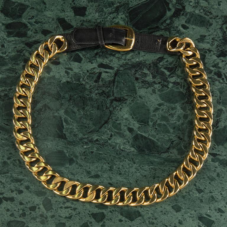 Belt by Chanel.