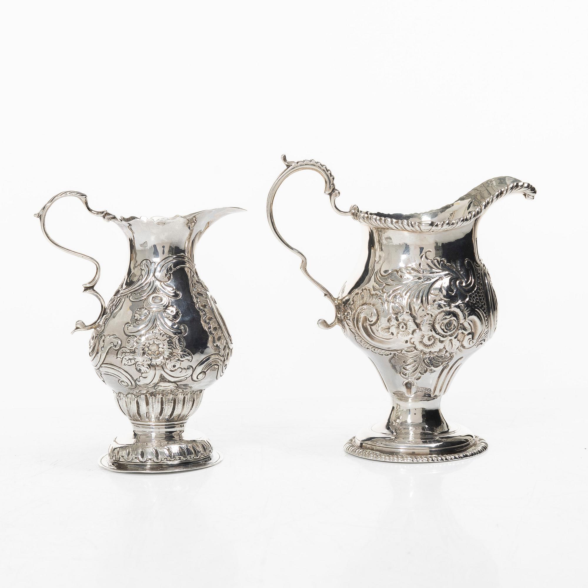 Two creamers, a tray, and a sugar tongs, silver, Rococo and Rococo style, 18th-19th century.