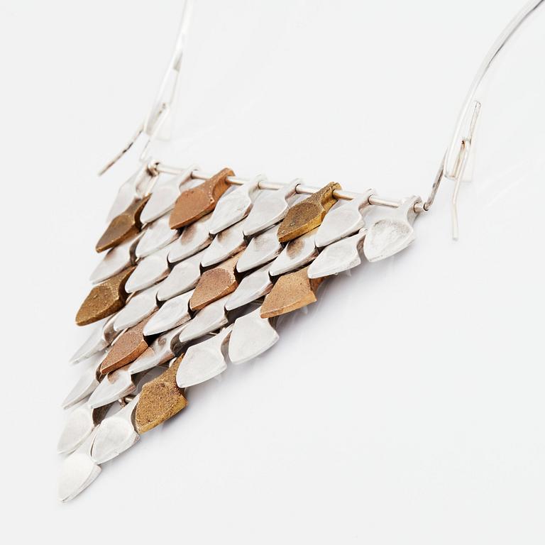 Inga-Britt "Ibe" Dahlquist, a bronze and silver necklace "Scales",  Visby 1965.