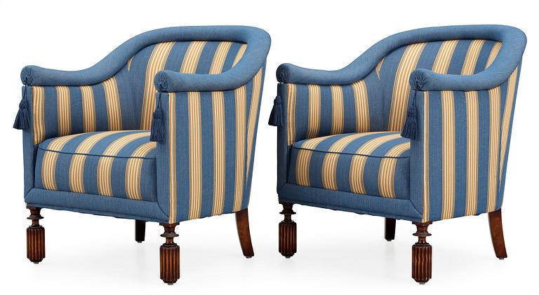 A pair of Axel-Einar Hjorth armchairs 'Library' by NK 1928.