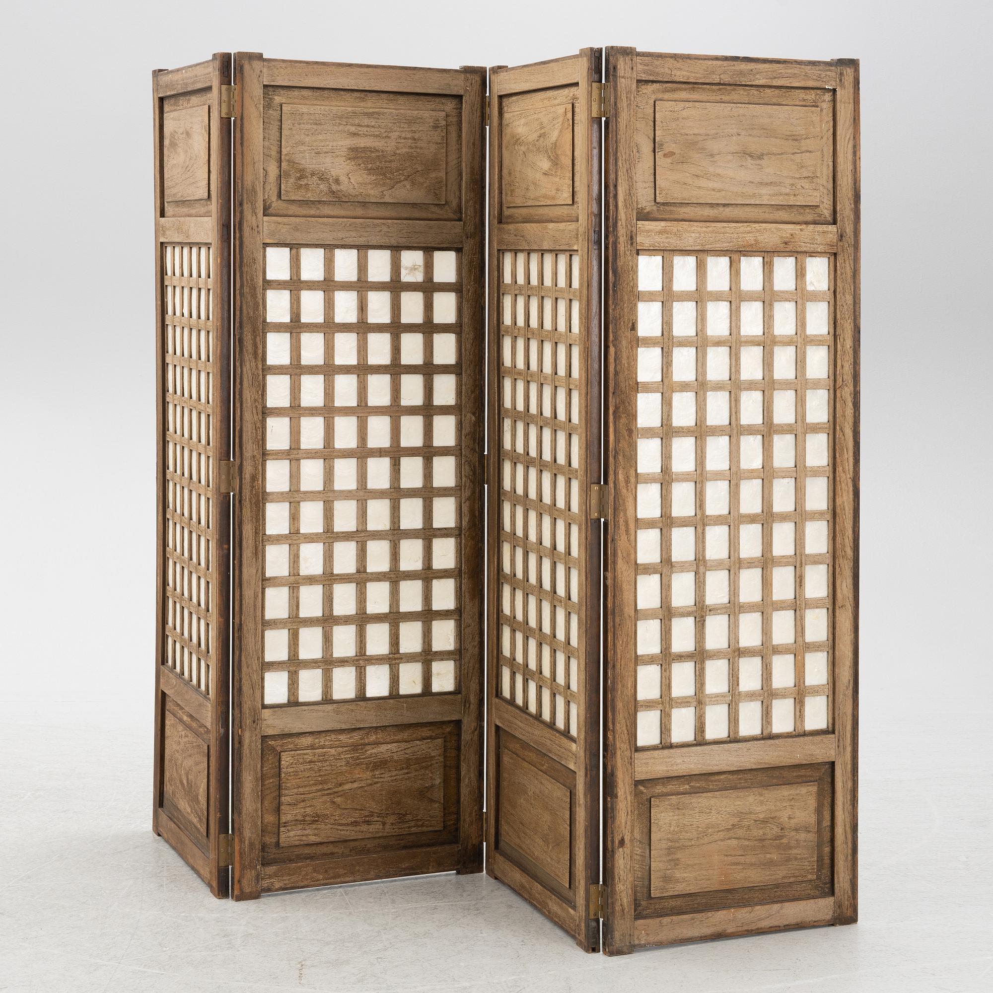 A four leaf folding screen, China, circa 1900.