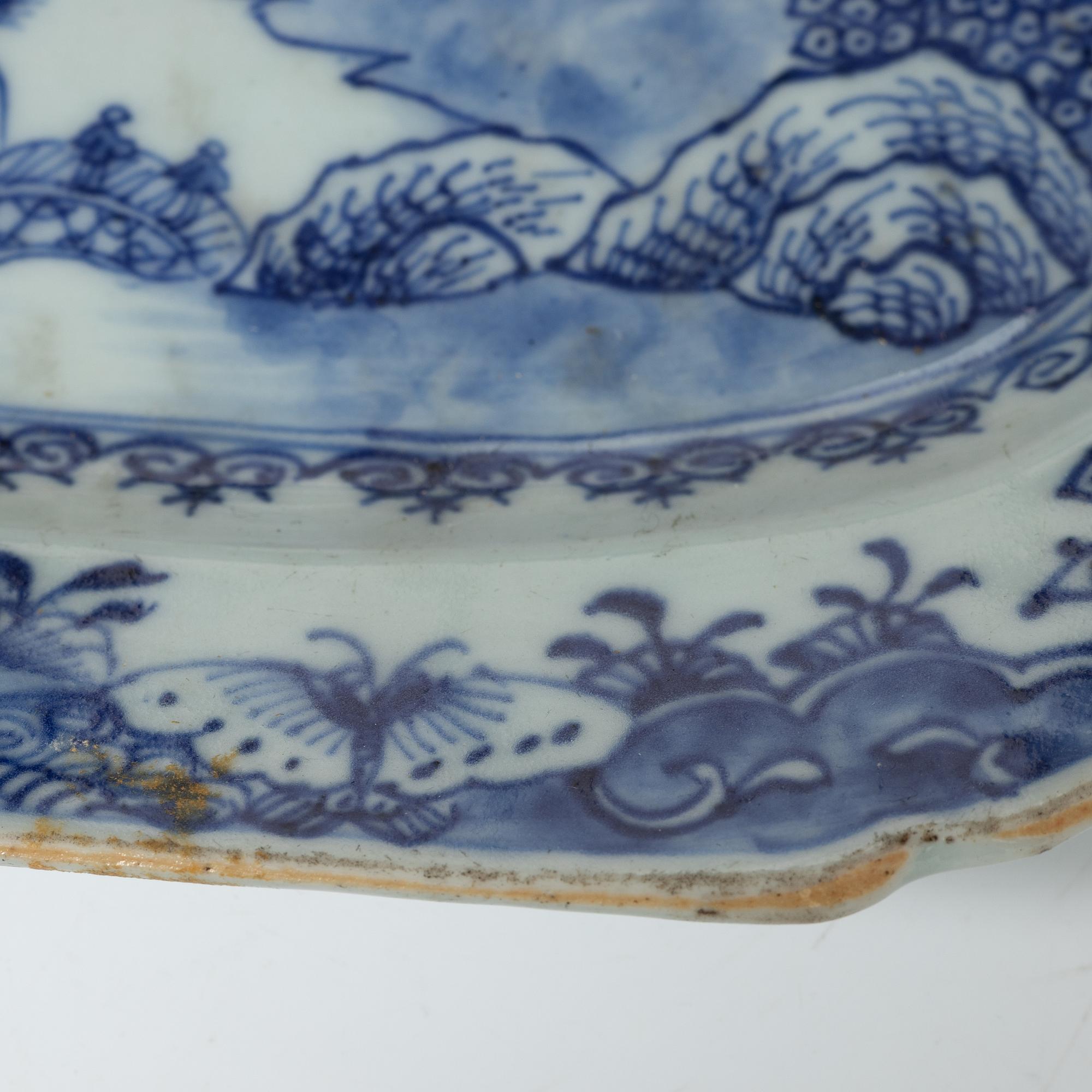 Two Chinese blue and white porcelain dishes and a small dish, Qing dynasty, 18th century.