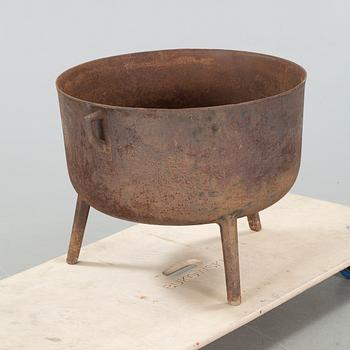 A 19th century iron pot.