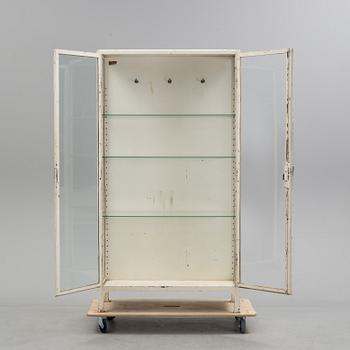 A mid 20th century metal display cabinet.