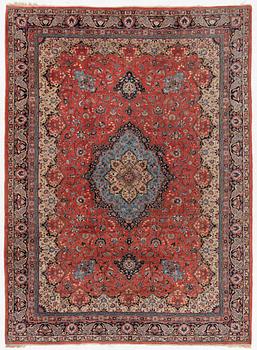 An oriental carpet, c. 370 x 275 cm.