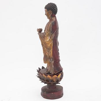A large gilt and lacquer sculpture group, three parts, 20th century.