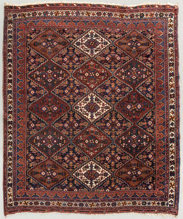 An antique Afshar carpet ca 143 x 129 cm.