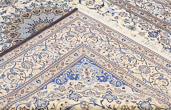 A carpet, Nain part silk s.k 9LAA, ca 355 x 260 cm.