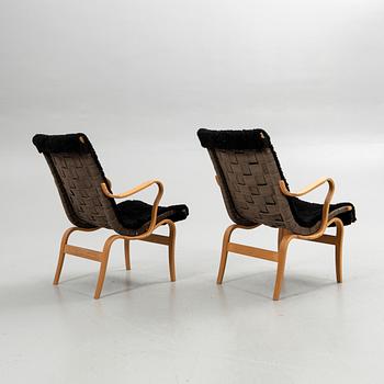 Bruno Mathsson, armchairs, a pair, "Eva", Bruno Mathsson International, Värnamo, second half of the 20th century.
