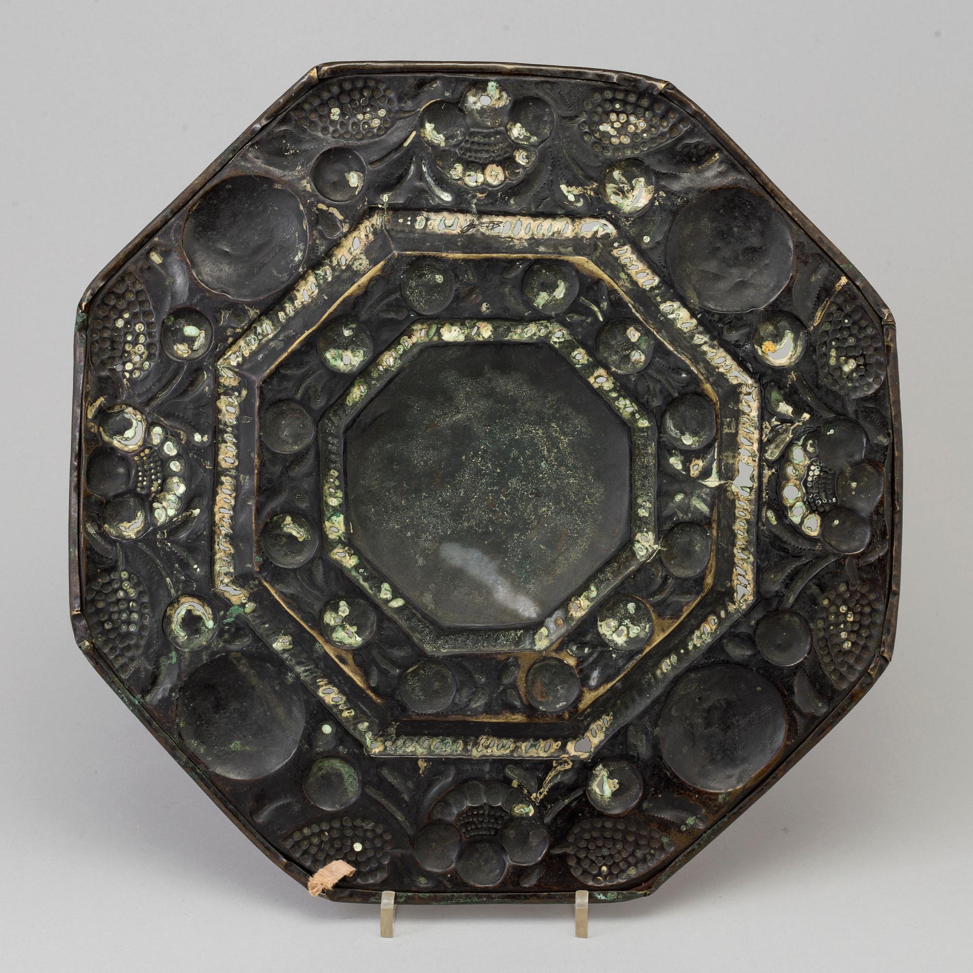 A BRASS DISH, probably 17th century.