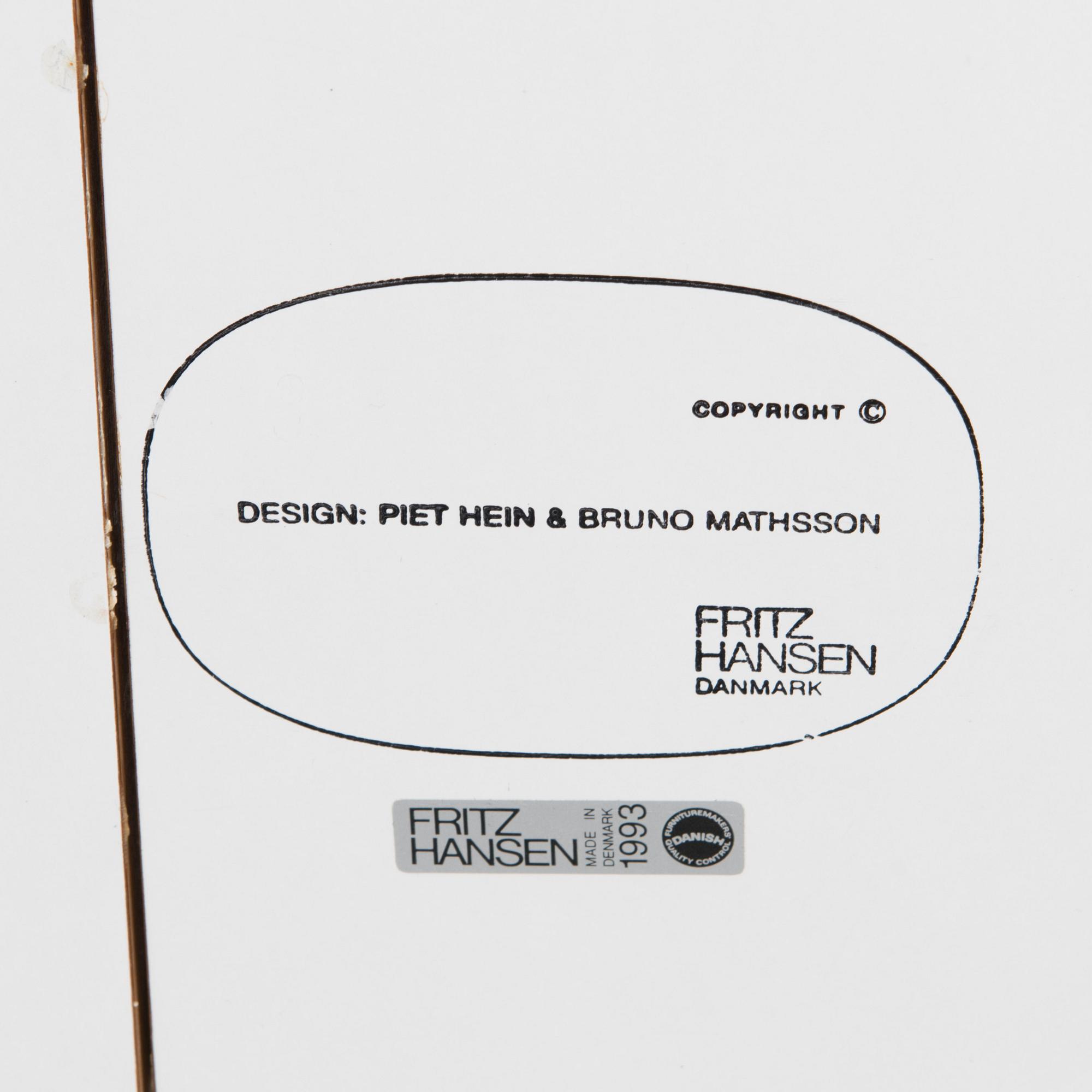 BRUNO MATHSSON AND PIET HEIN, a 'Superellips' dining table from Fritz Hansen, 1993.