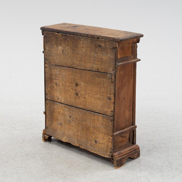 A Baroque style cabinet, circa 1900 with older parts.