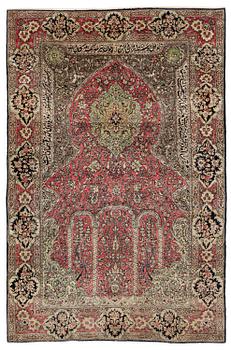 A semi-antique silk Quum, c. 216 x 141 cm.