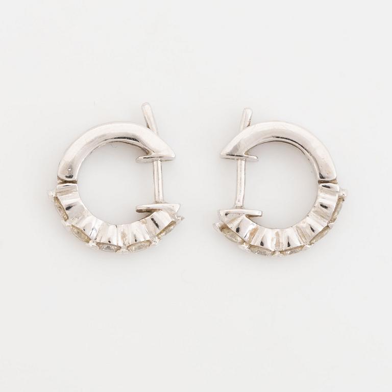 Brilliant cut diamond earrings.