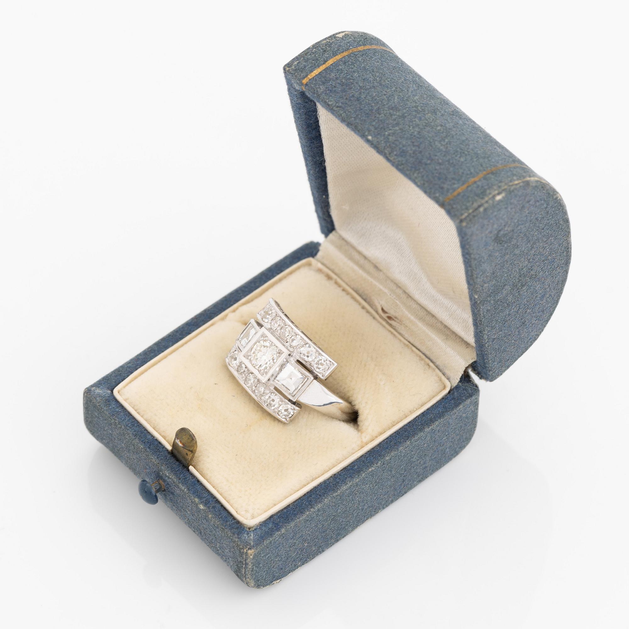 Brilliant-cut, old-cut brilliant and step-cut diamond ring.