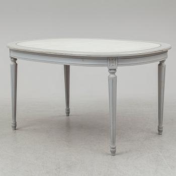 A dining table and four chairs, gustavian style, late 20th century.
