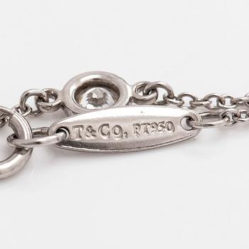 Tiffany & Co, Elsa Peretti, a platinum 'Diamonds by the Yard' bracelet with a brilliant-cut diamond.