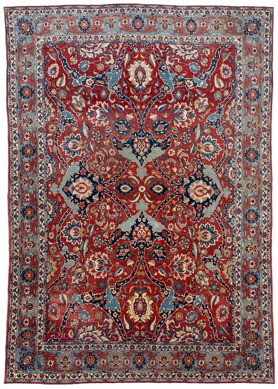 An antique/semi-antique Tabriz carpet of 'Vase design', ca 509 x 359 cm.