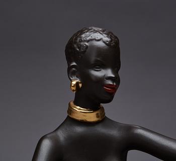 FIGURIN, etikettmärkt Goldscheider.