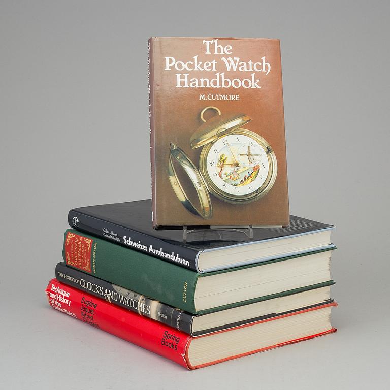 A set of 5 watch books.