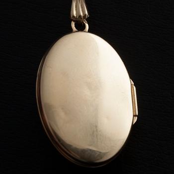 MEDALJONG/HÄNGE, 14K guld, akvamarin, 4 små diamanter. Vikt 5,8 g.