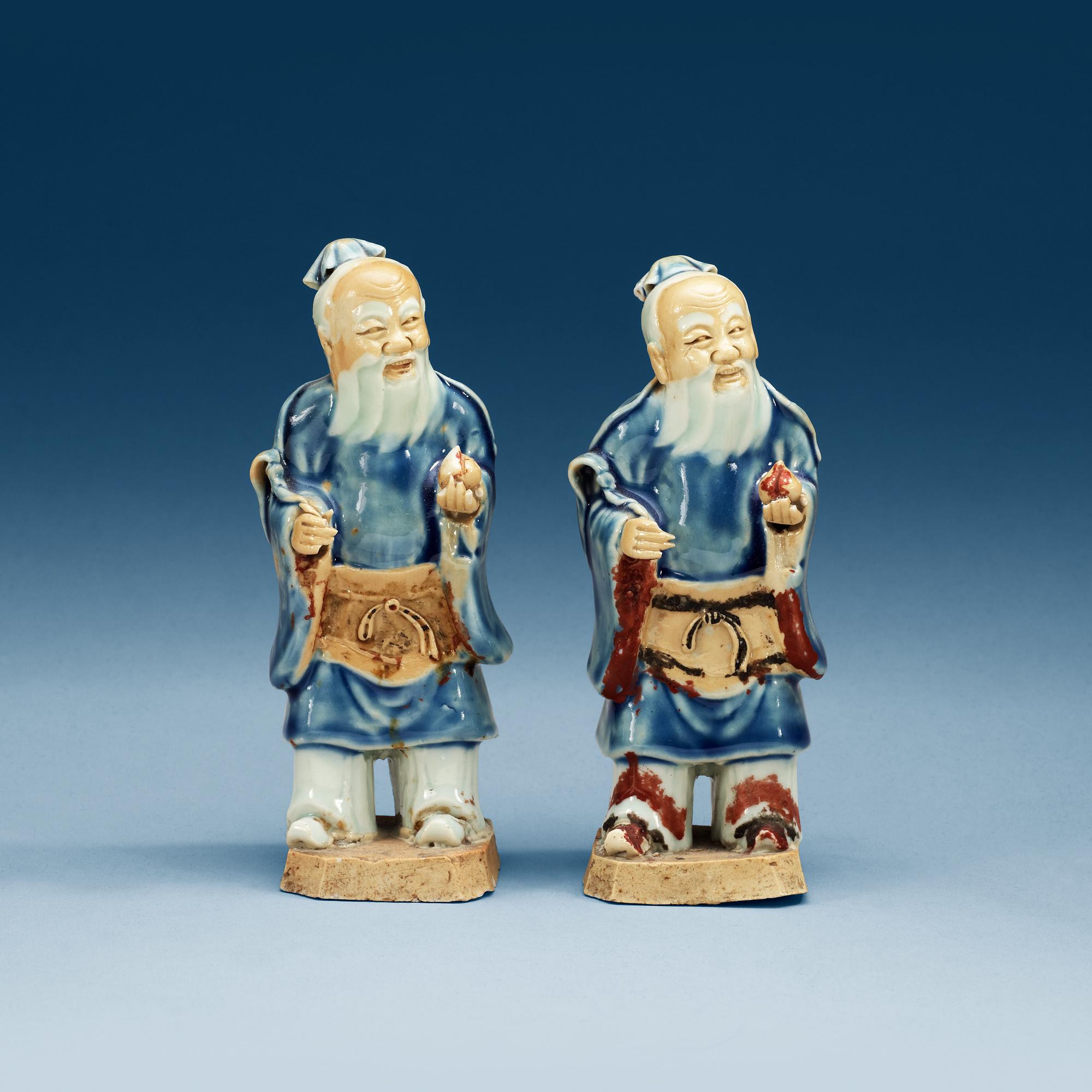 A pair of figures of sholaou, Qing dynasty, 18th Century.