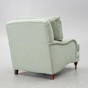 A Howard model armchair, contemporary.