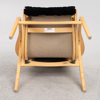 Yngve Ekström, an armchair and a footstool, "Lamino", Swedese, second half of the 20th century.