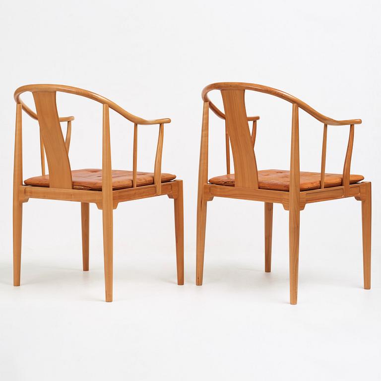 Hans J. Wegner, a pair of "China-Chair" in cherry wood, Fritz Hansen, Denmark, 1969.