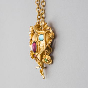 A 21st century Christian Lacroix costume jewlery pendant with chain.