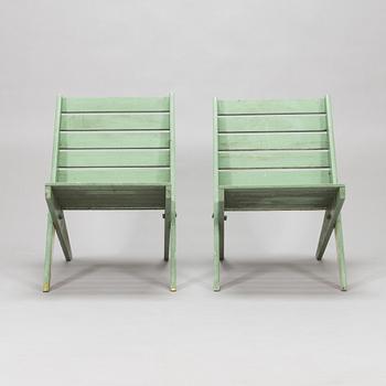 A pair of mid-20th century garden chairs.